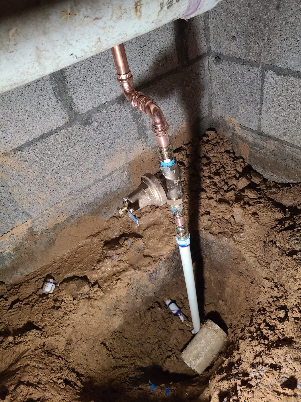 Residential water service and pressure regulator installation