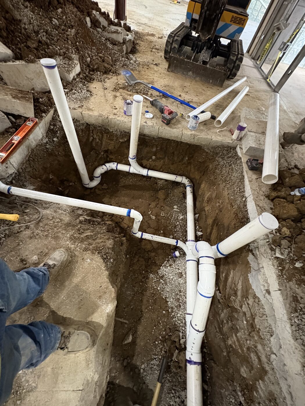 Underground plumbing installation before the slab is restored